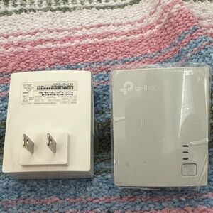 Two TP-Link TL-PA4010 Nano PowerLine Adapters